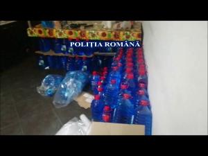 Spirt obținut din lichid de parbriz/Acțiune de amploare au desfășurat polițiștii specializați în investigarea criminalității economice din Prahova, Argeș și Ilfov
